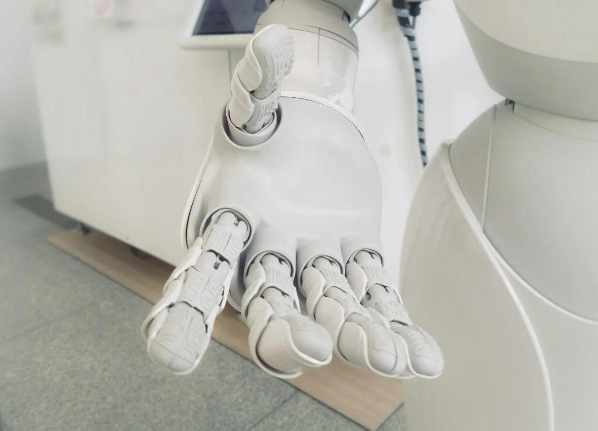 Robotic hand illustrating AI-powered assistants and human-machine interaction